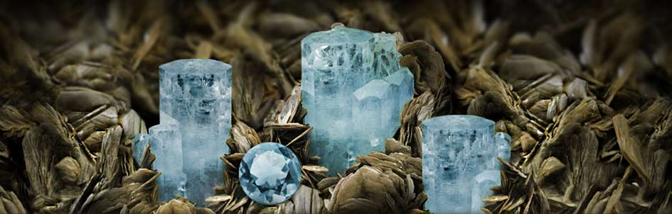 aquamarine prisms on a matrix of mica