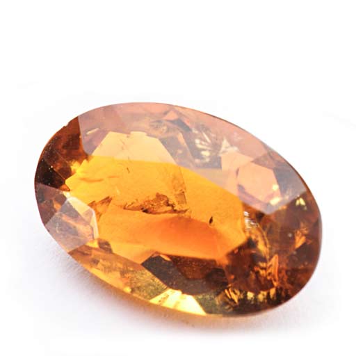 Faceted citrine gemstone displaying golden hues