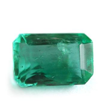 rectangular step-cut emerald specimen with beveled corners