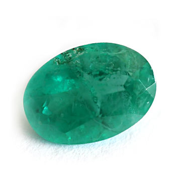 an oval shaped emerald gemstone