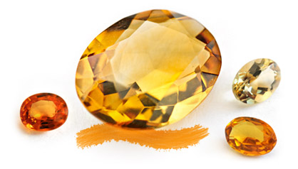 Philippine Gemcamp laboratory gemologists show a citrine gemstone