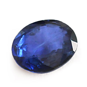 an oval mixed-cut blue sapphire