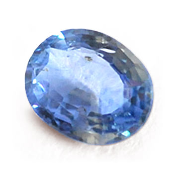 a light-colored bluish sapphire gem