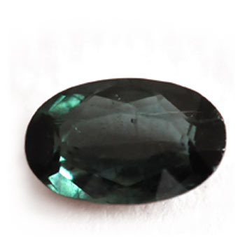 elongated dark-toned tourmaline gemstone